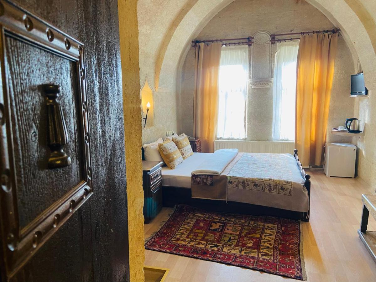The Village Cave Hotel Гьореме Стая снимка